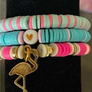 Bracelet set of three, pink and blue themed.